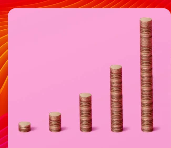 A series of wooden blocks arranged in ascending order on a pink background, symbolizing growth and progress.